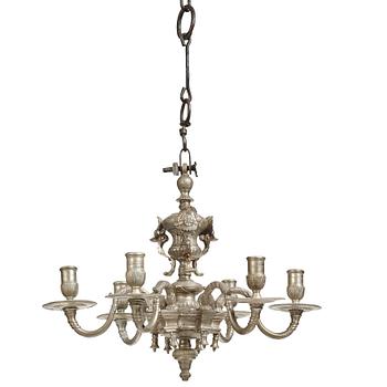A Swedish silvered brass presumably late Baroque chandelier in the style of Jean Berain.