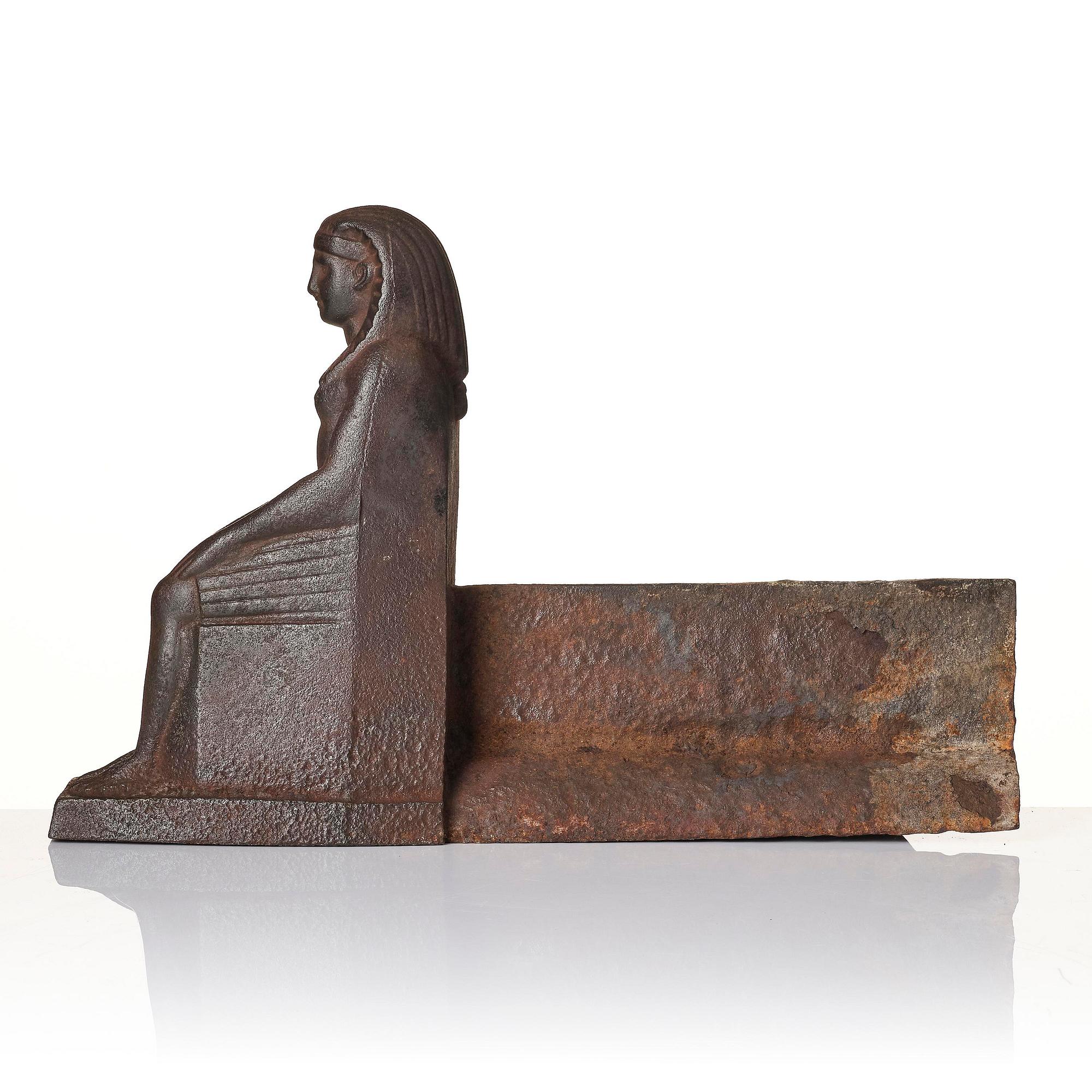 A pair of French Empire cast iron chenets, first part 19th century.