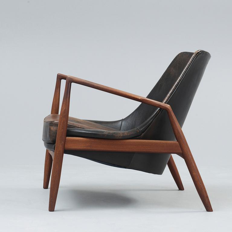 An Ib Kofod Larsen 'Sälen' teak and black leather armchair, OPE, Jönköping, Sweden 1950's-60's.