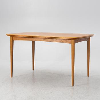 A dining table, mid-20th Century.
