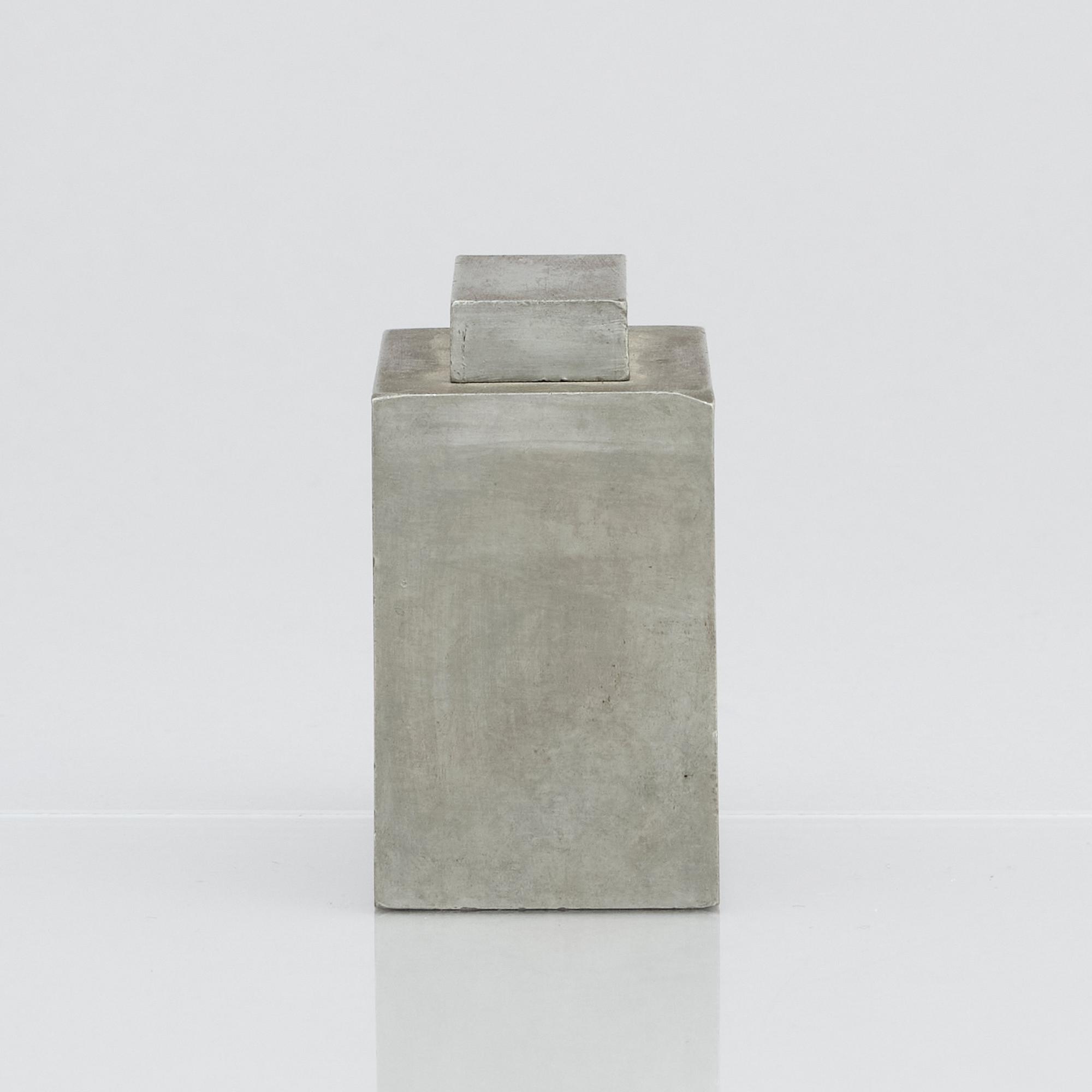 Firma Svenskt Tenn, a pewter lidded cannister with brass decor, Stockholm 1929.