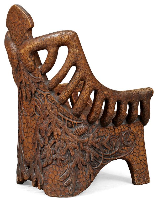 A Gustaf Fjaestad art noveau sculptured pine armchair, Sweden 1894.