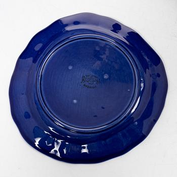 Hertha Bengtson, a stoneware bowl and twelve plates, Rörstrand, Sweden.