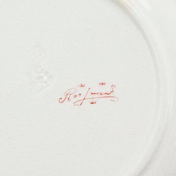 13 pieces of earthenware tableware from Rörstrand, first half of the 20th century.