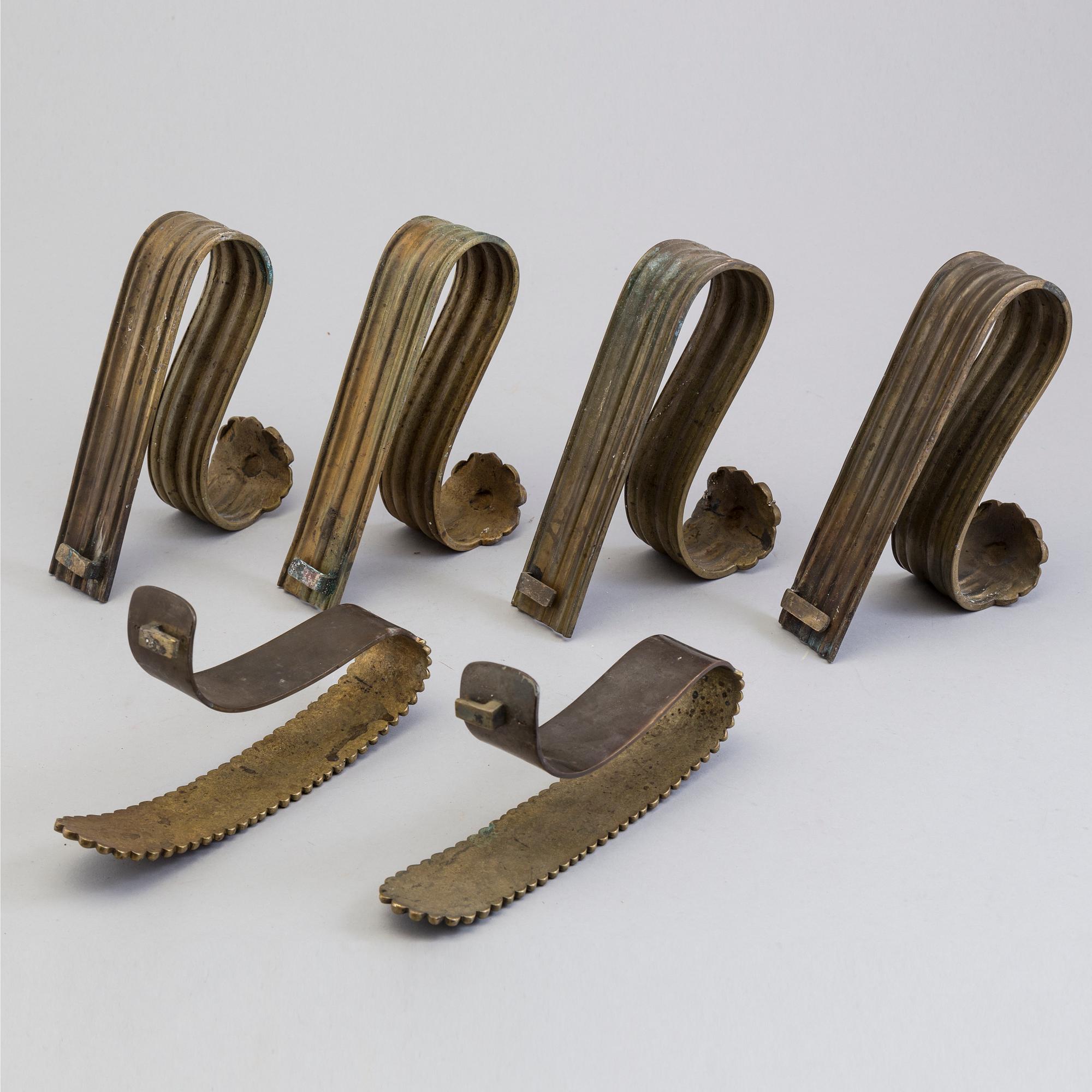SIX BRONZE CURTAIN TIE-BACKS (4+2), 19th century.