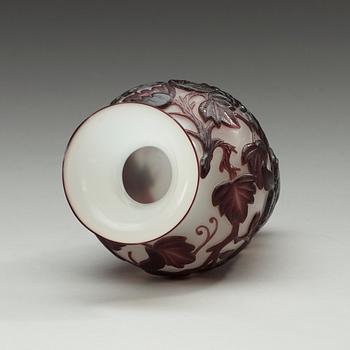 A Chinese purple overlay peking glass vase, 20th Century.