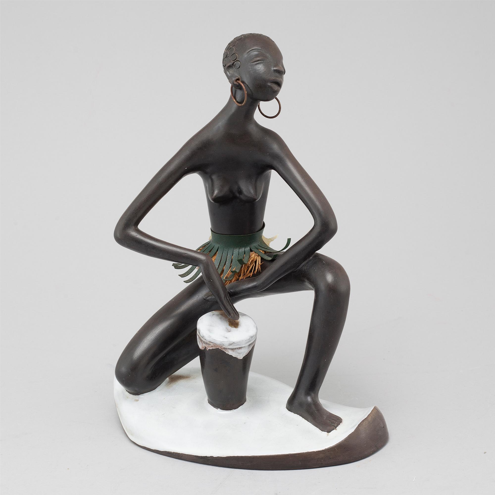 A stoneware figurine from Anzengruber in Austria, around the mid 20th century.