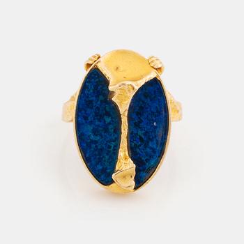 A Lapponia ring design Björn Weckström in 18K gold set with an opal.