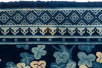 A carpet, semi-antique Baotou, China, figural, ca 260.5 x 184.5 cm.