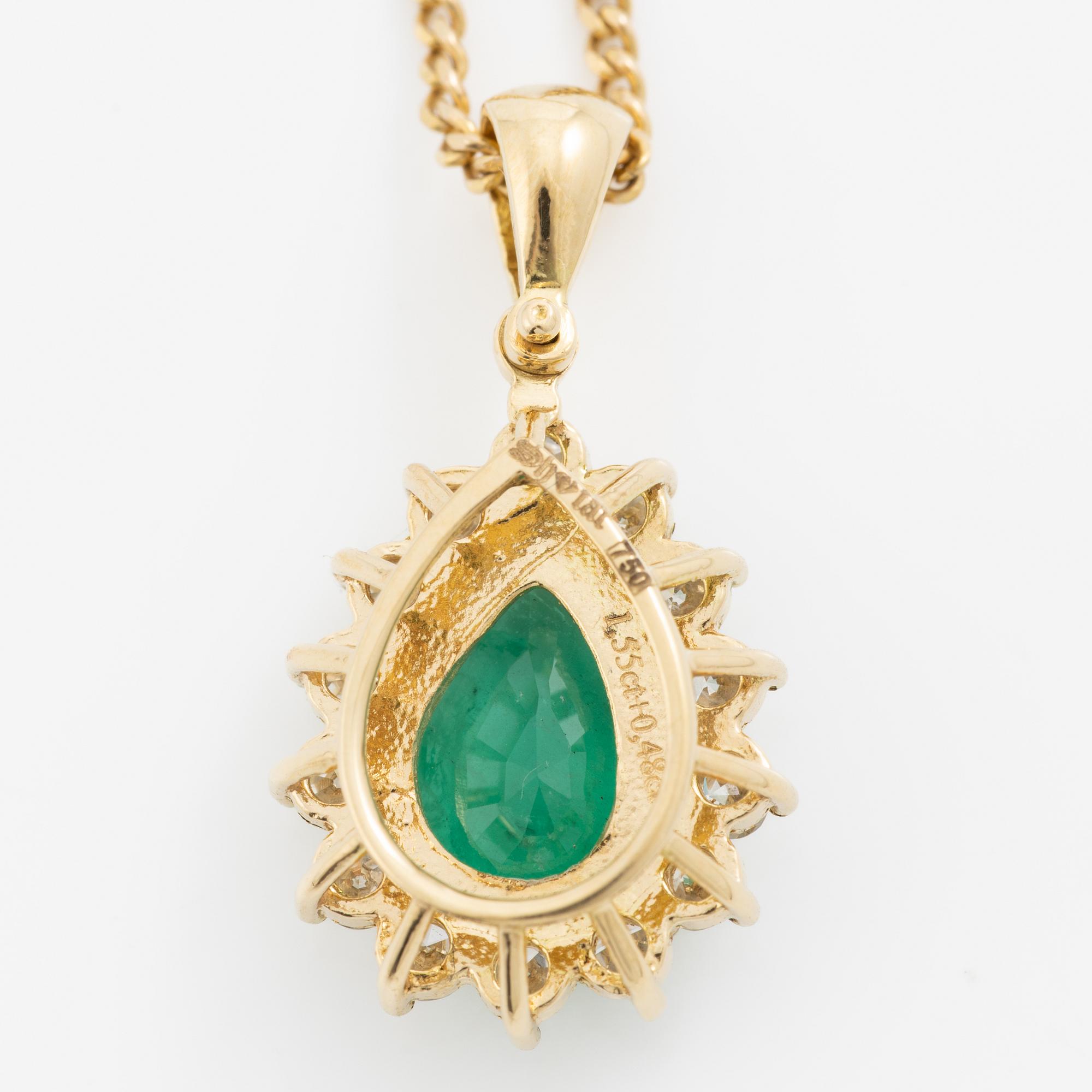 Gold necklace with a drop-shaped emerald and octagon-cut diamonds.