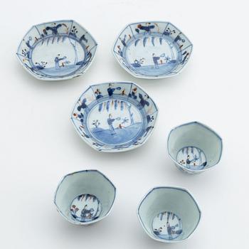 Three Chinese porcelain cups and saucers, Qing dynasty, 18th century.