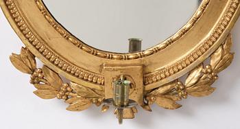 A pair of late Gustavian giltwood one light girandoles, Stockholm, circa 1800.
