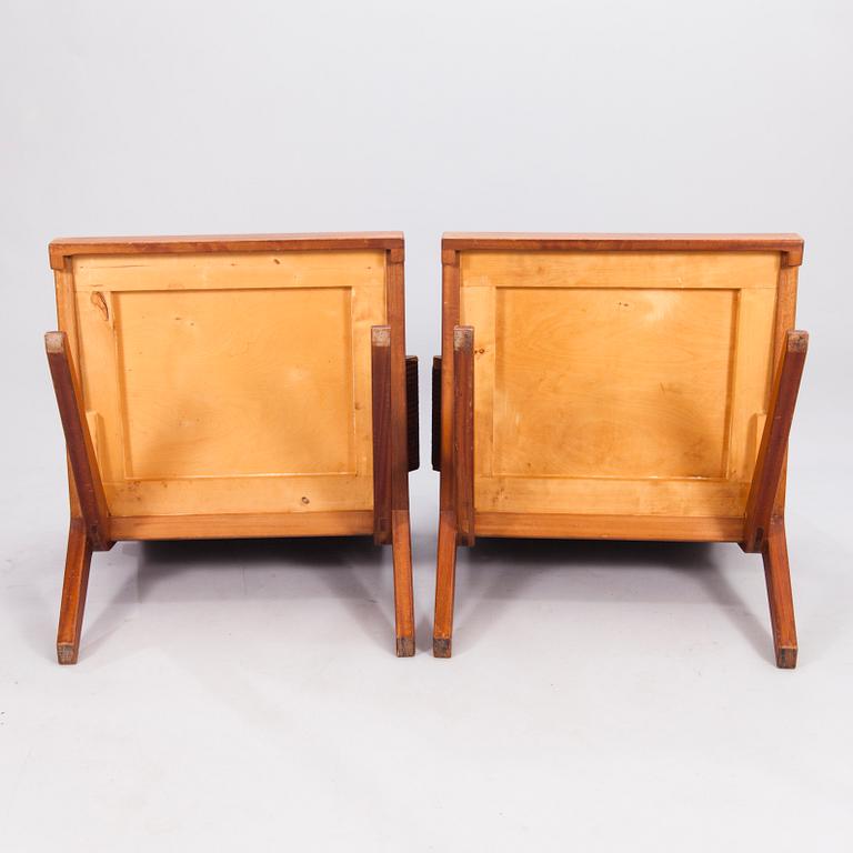 OLAVI HÄNNINEN, A 1960s 'Bumerang' armchairs for HMN Huonekalu Mikko Nupponen, Lahti, Finland.