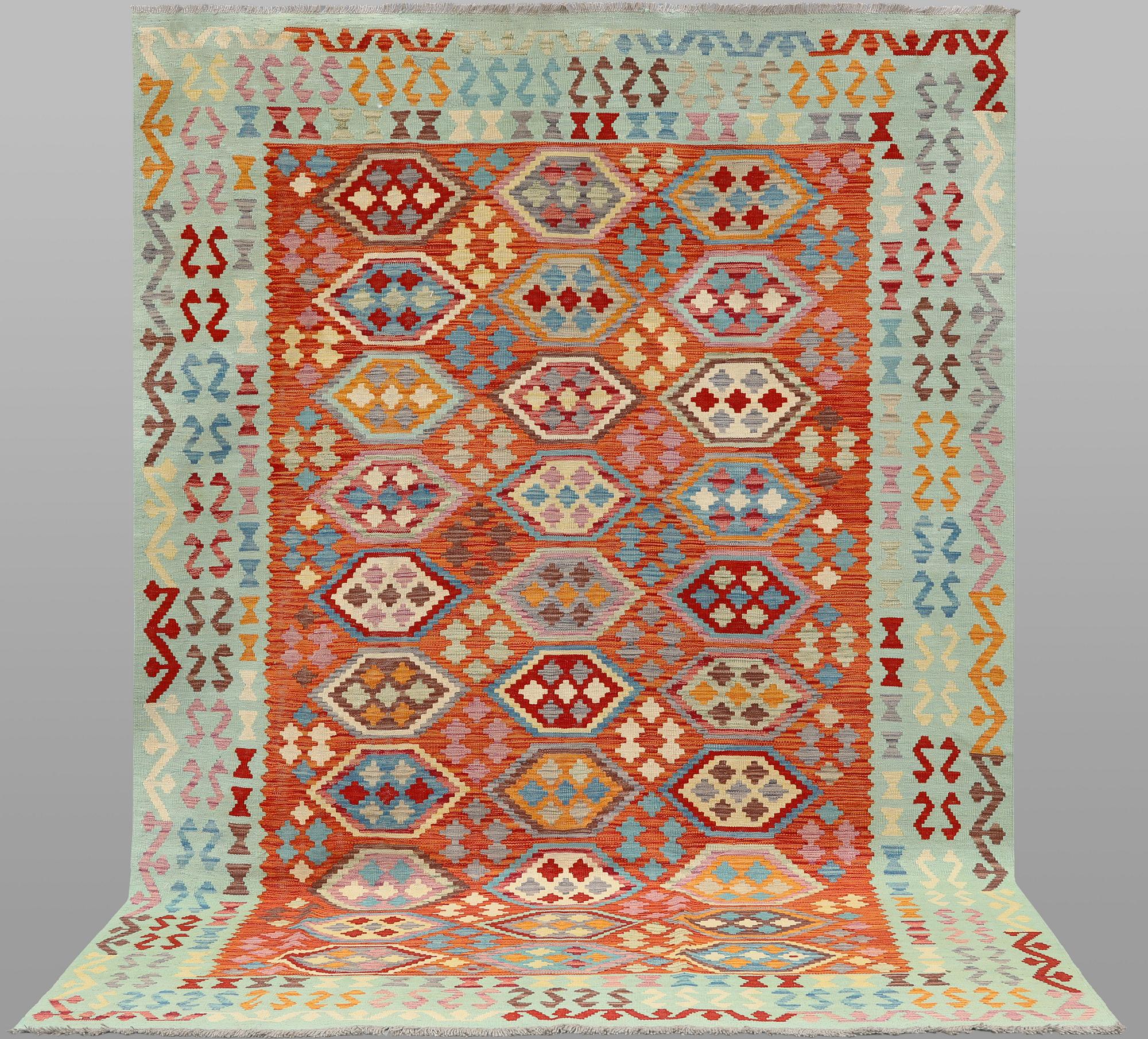 A Kelim carpet, c. 298 x 199 cm.