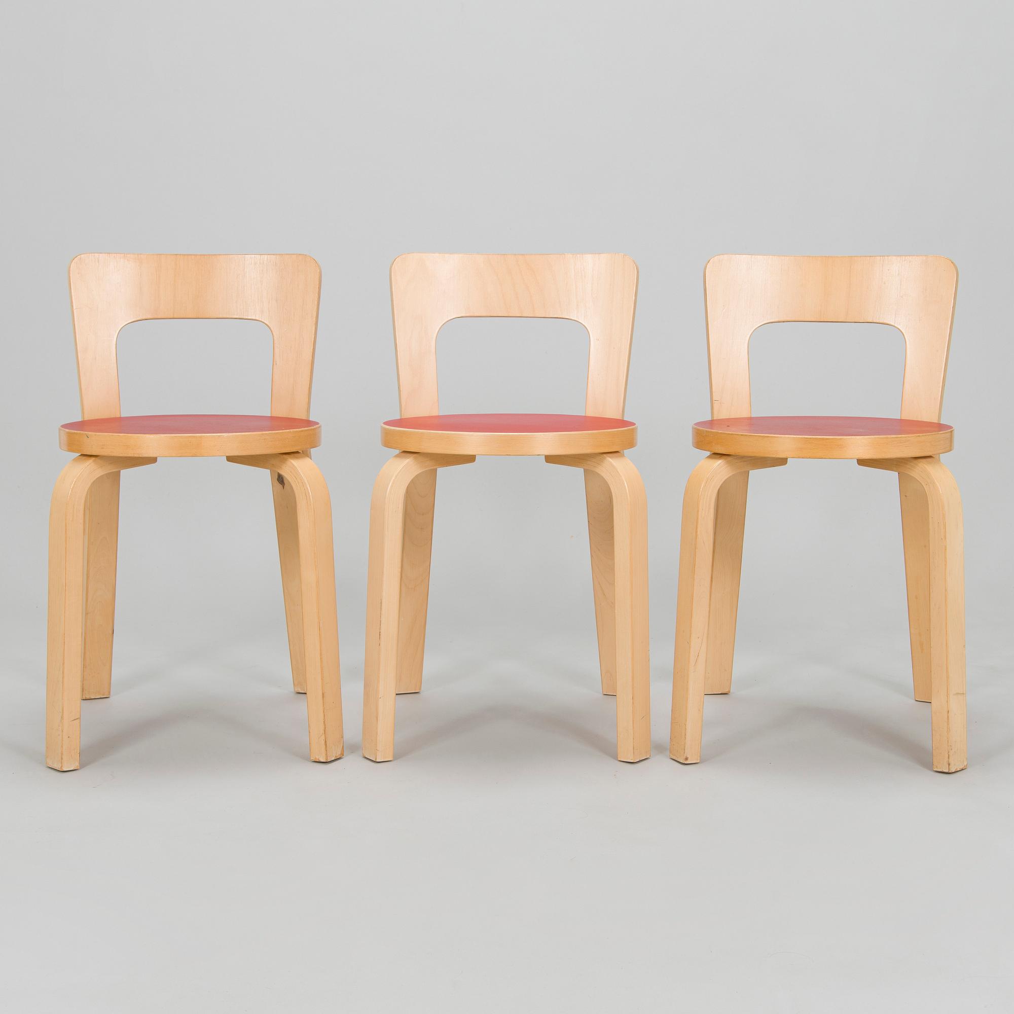 Alvar Aalto, A mid-20th century drop leaf table and three chairs for O.Y. Huonekalu-ja Rakennustyötehdas A.B.