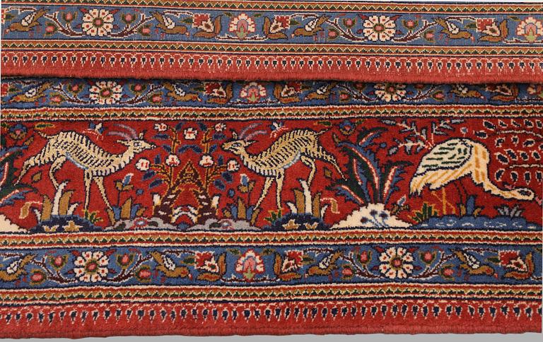 A Moud part silk carpet, 354 x 252 cm.