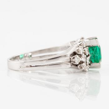 A W.A. Bolin ring 18K white gold with an emerald-cut emerald and brilliant-cut diamonds.