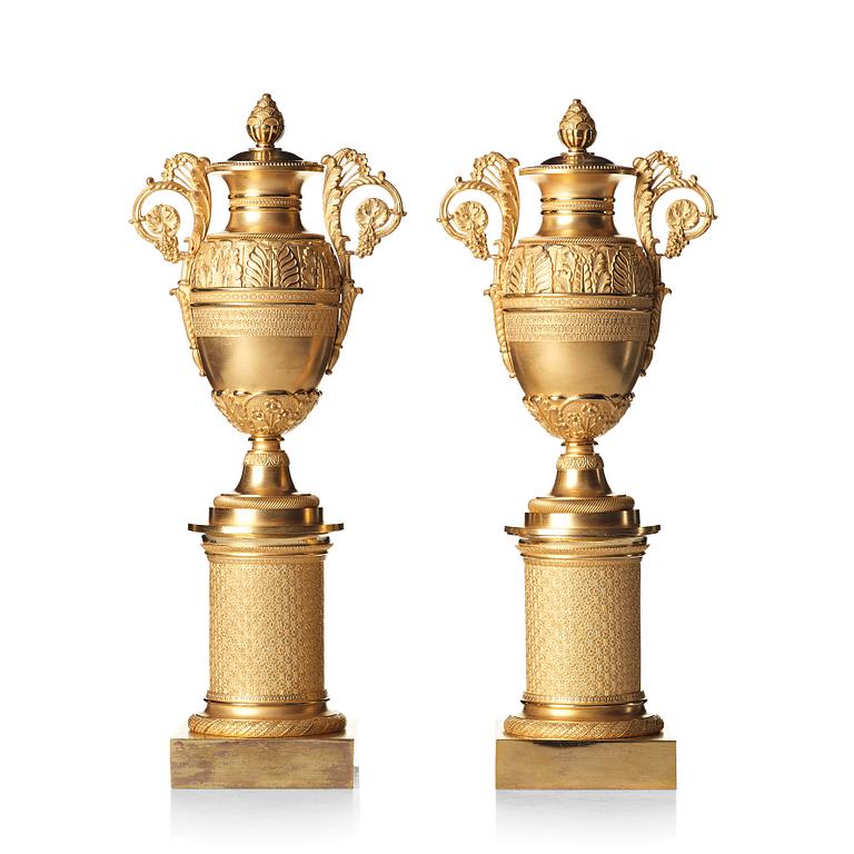 A pair of French Empire candlesticks, early 19th century.