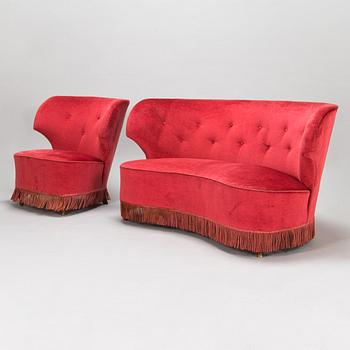A mid-20th -century sofa and armchair.