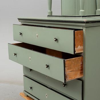 A combined clock and chest of drawers from late 19th  century.