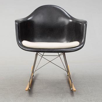 A 'Rocket chair' by Charles & Ray Eames, Herman Miller, late 20th century.