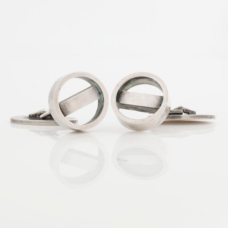 A pair of cuff links by Georg Jensen.