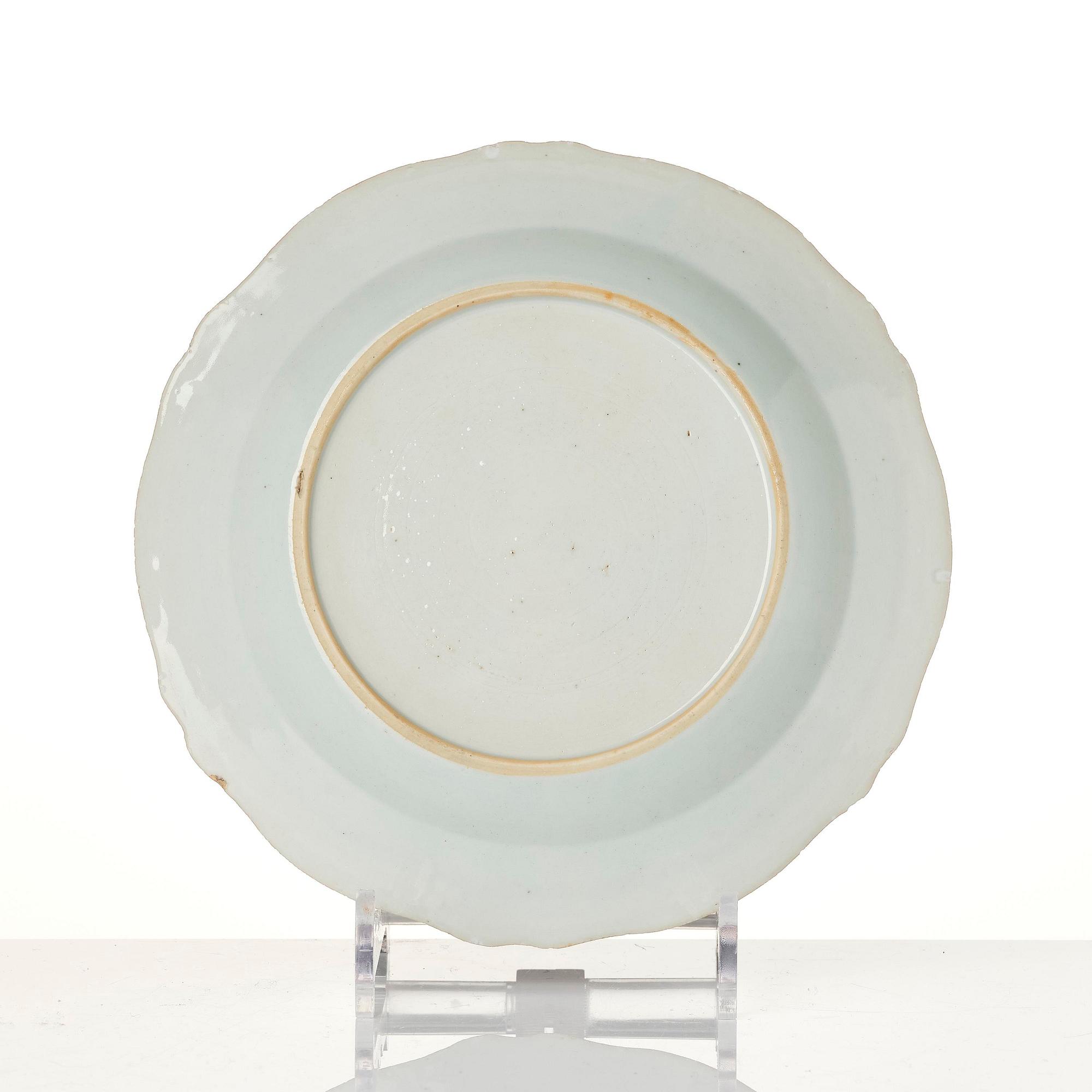 A group of famille rose 'double peacock' serving dishes, Qing dynasty, Qianlong (1736-95). (8 pieces).