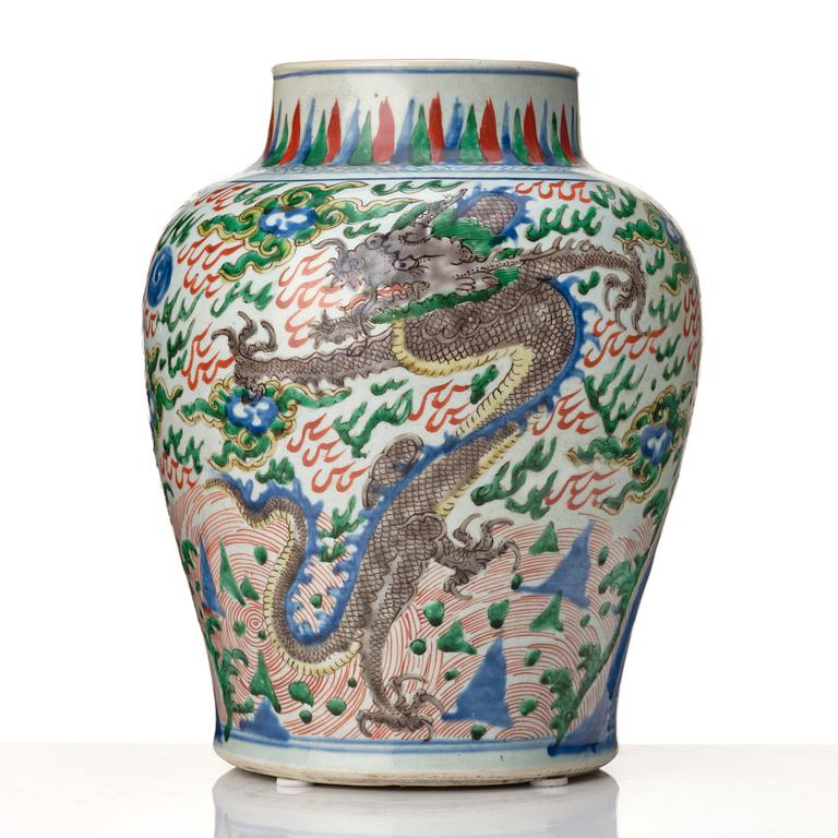 A matched pair of Transitional Wucai jars, 17th Century.