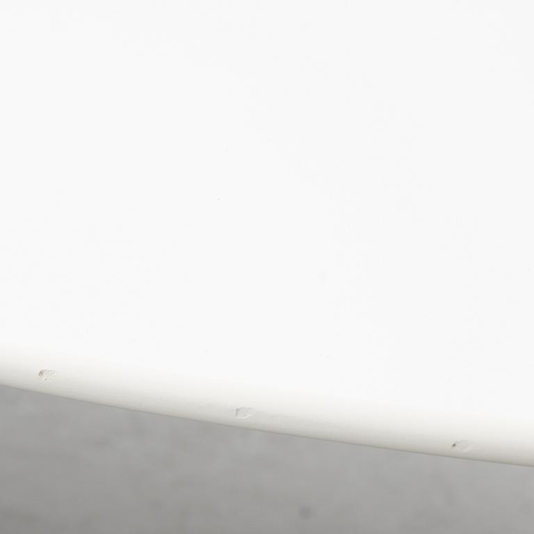 Vico Magistretti, a "Shine" dining table with twelve chairs, De Padova, Italy, around the year 2000.