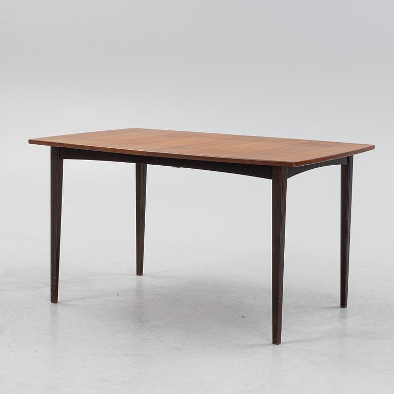 A teak dining table, mid 20th Century.