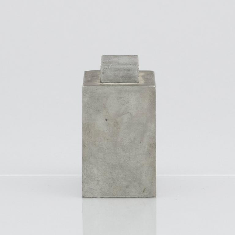 Firma Svenskt Tenn, a pewter lidded cannister with brass decor, Stockholm 1929.