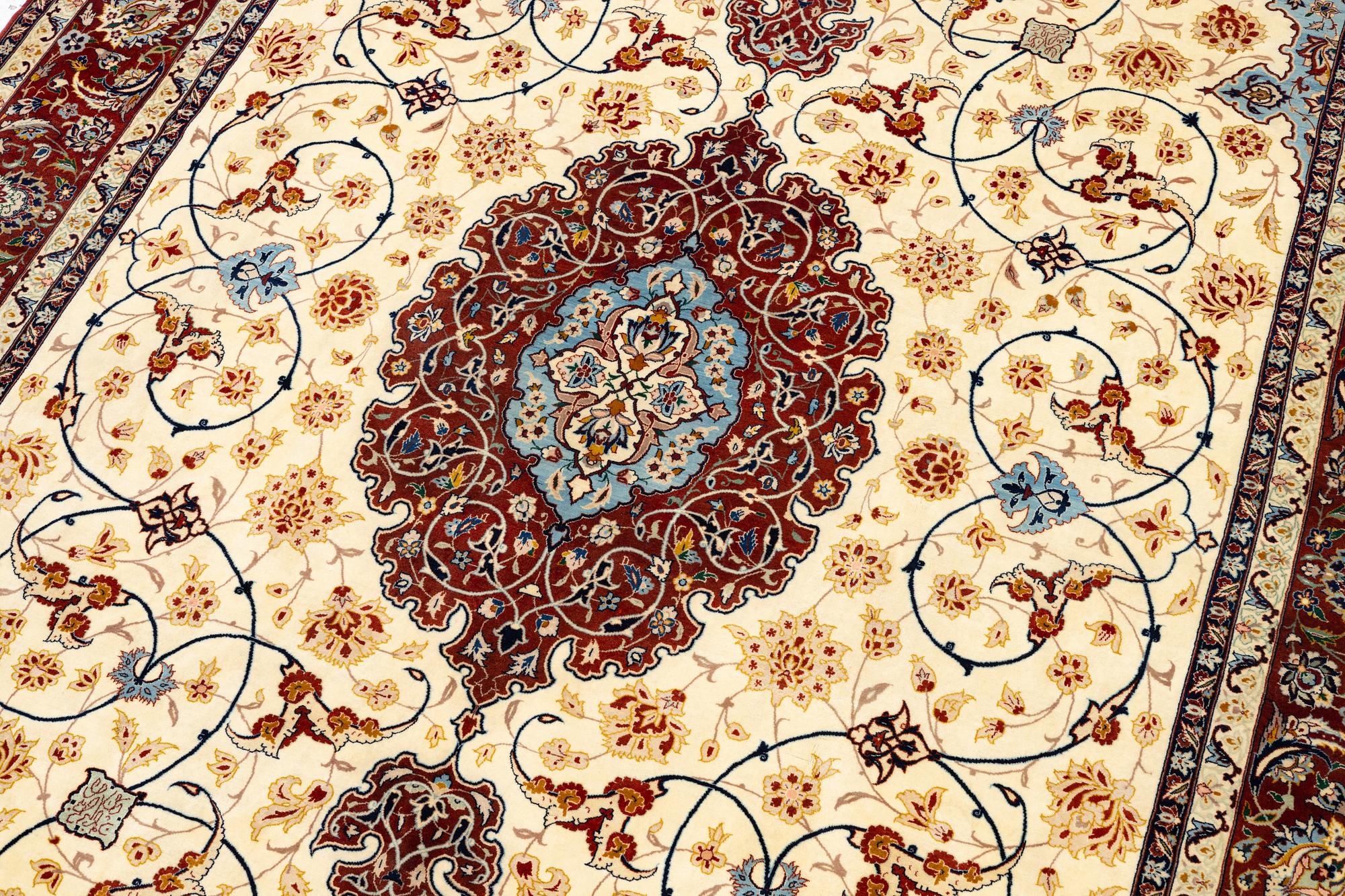 An Isfahan carpet, Central Persia, signed Akbaroff, c. 315 x 205 cm.
