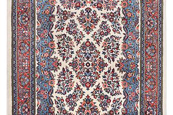 A rug, Sarouk, c. 210 x 137 cm.