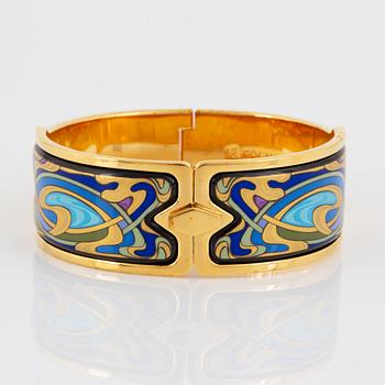 FREY WILLE, an enamel and gold plated metal bangle.