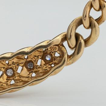 A 14K gold necklace with diamonds ca 0.035 ct in total.
