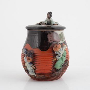 A Japanese sumida ware tobacco jar with cover, 20th century.