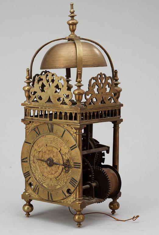An English middle 17th century brass lantern clock signed Thomas Loomes At The Mermayd In Lothbury.
