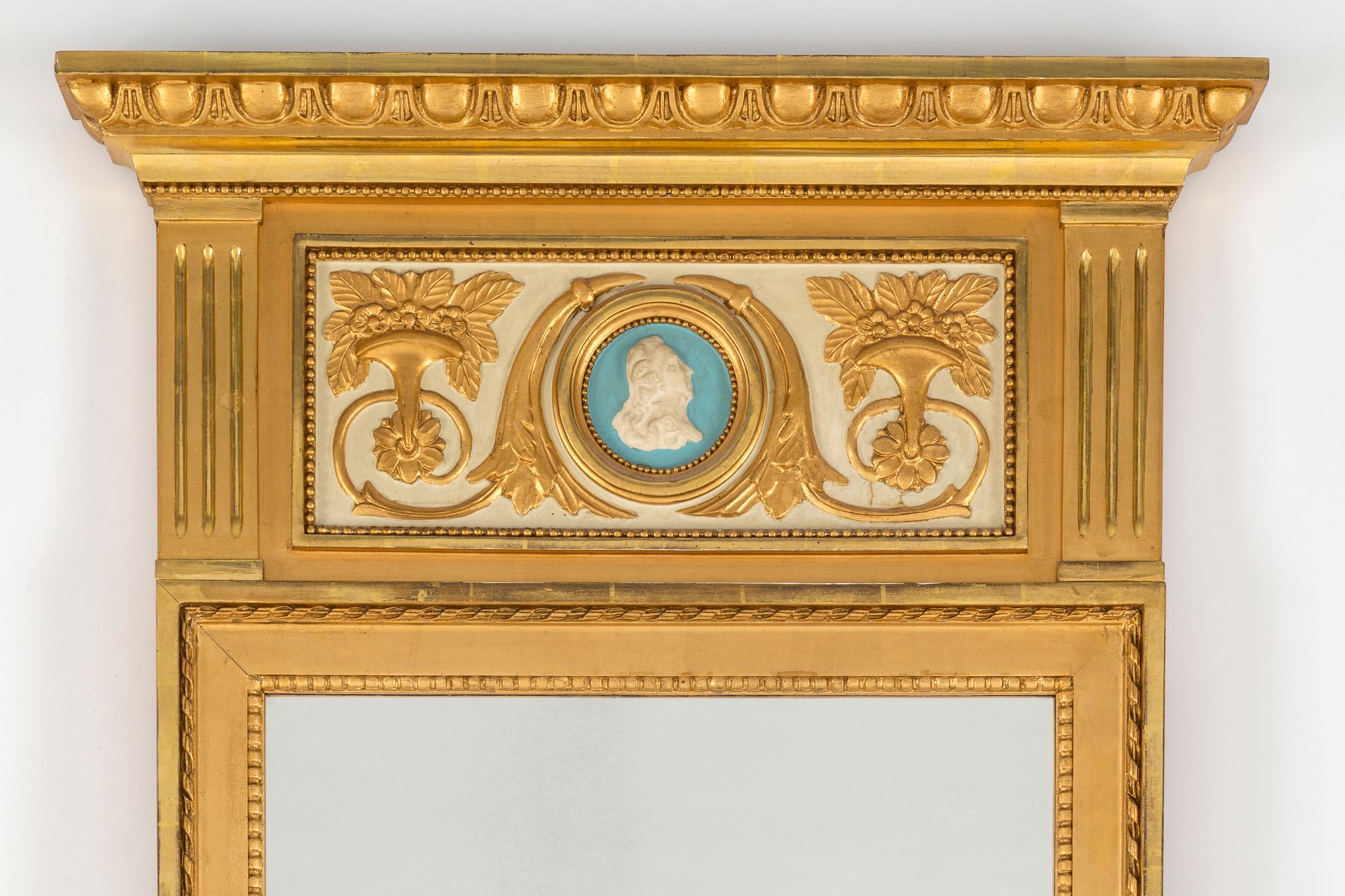 A MIRROR AND CONSOLE TABLE, gustavian style, mid 1900s.