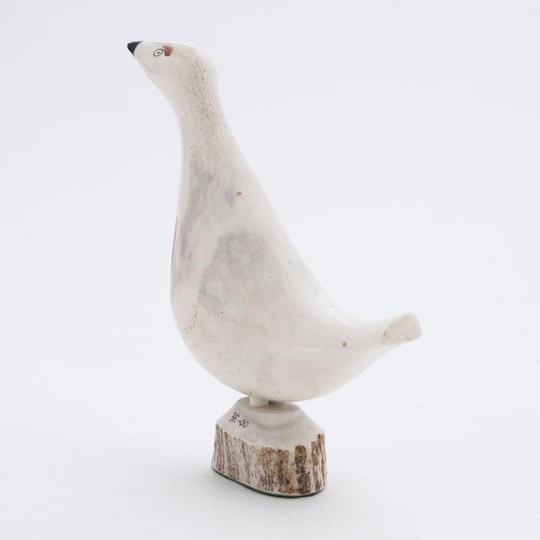 A reindeer horn figurine by Bertil Fällman, signed and dated -00.