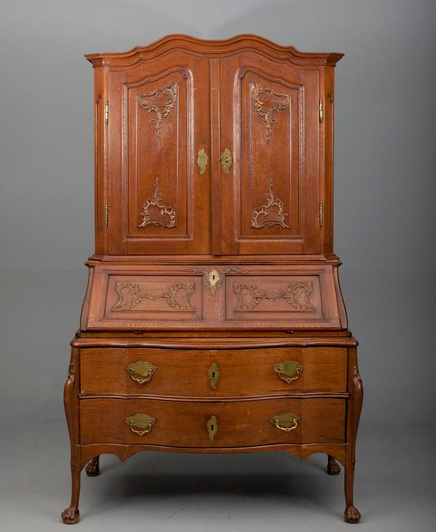 A TWO-PIECE WRITING CABINET.