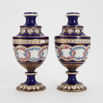 A pair of French porcelain vases, 19th Century. Sèvres style mark.