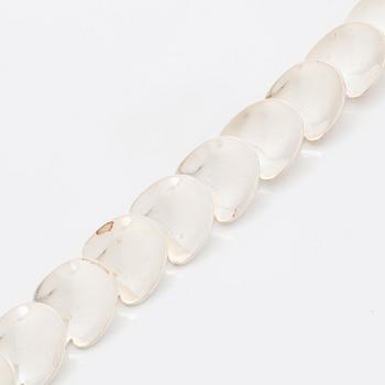 A silver necklace by Viggo Wollny.