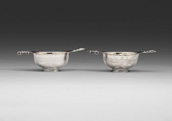 519. A pair of Swedish early 19th century parcel-gilt cups, marks of Olof Löfvander, Luleå 1807.