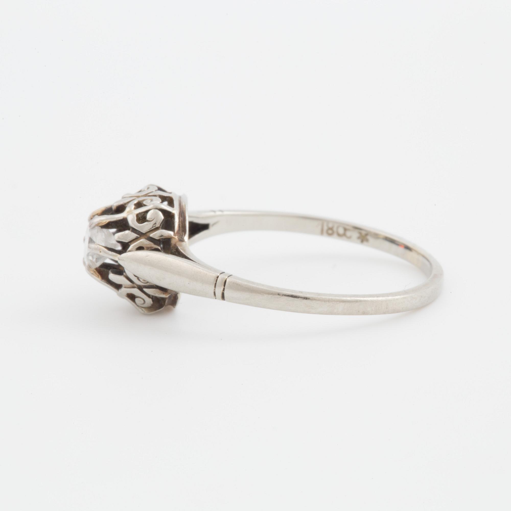 A ring set with a transitional-cut diamond.