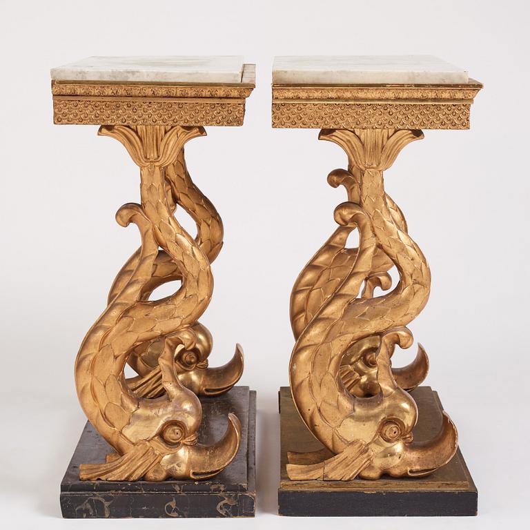 A matched pair of Swedish Empire console tables, first half of the 19th century.