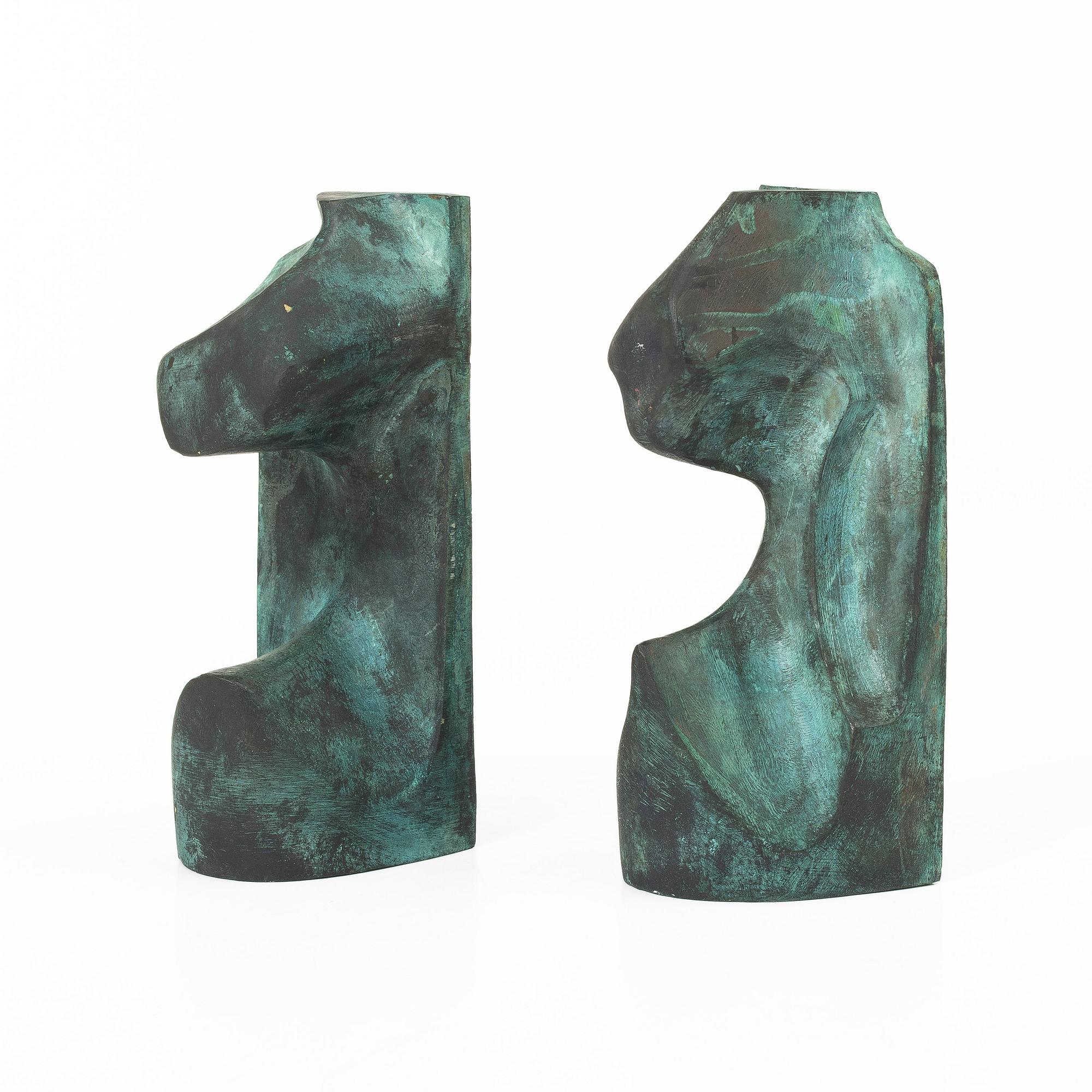 Björn Selder, a pair of green-patinated bronze sculptures/bookends, signed and numbered 4/100.