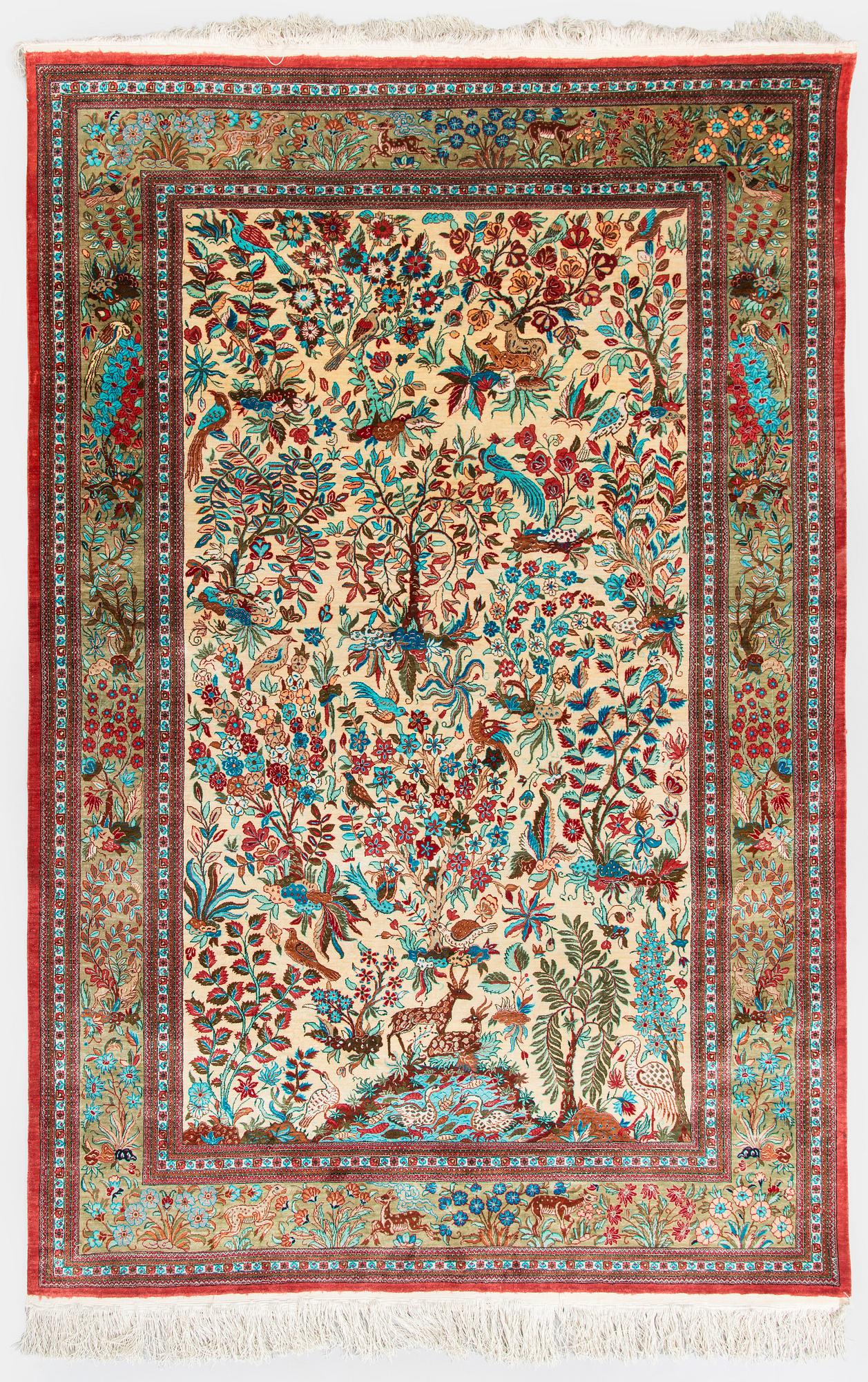 A silk Qum rug, central Persia, c. 210 x 138 cm.