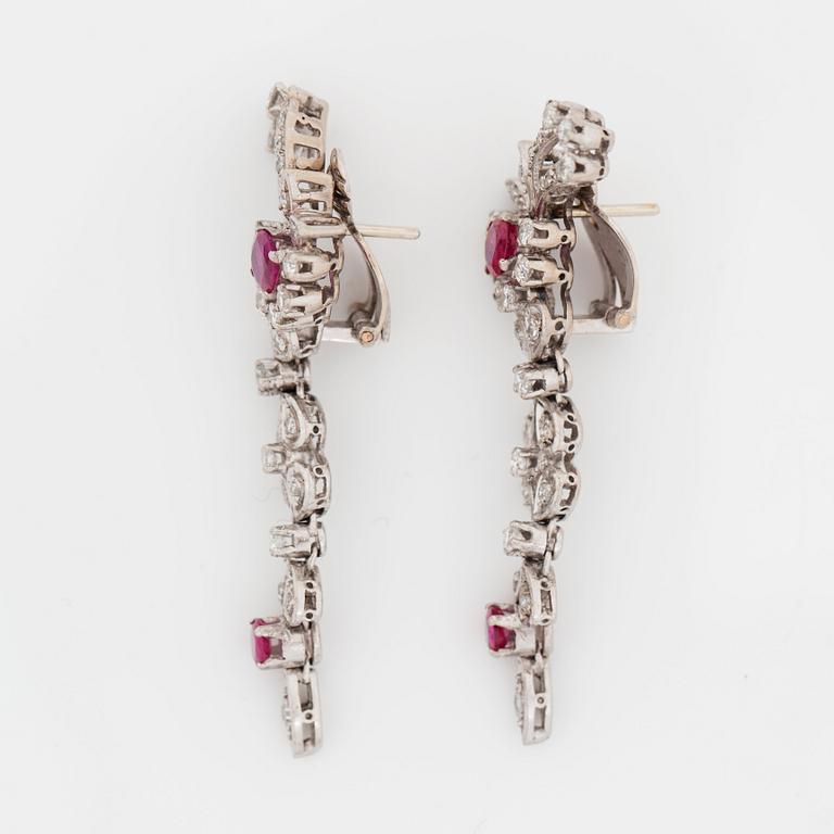 A pair of ruby and single- and brilliant-cut diamond earrings.