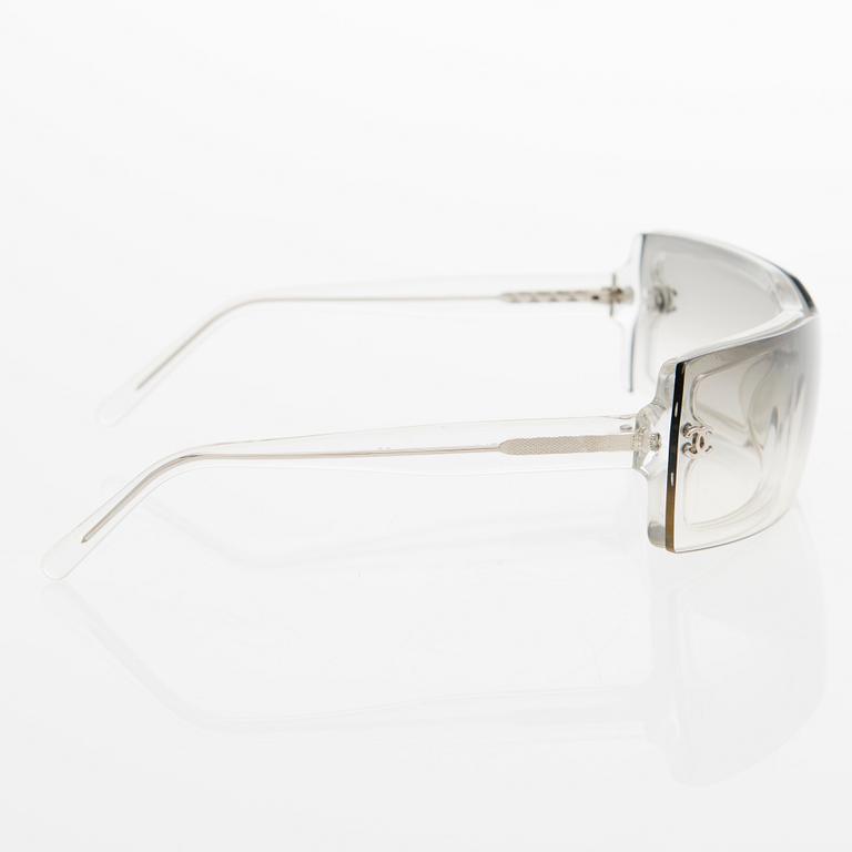 A Pair of Model 5067 Sunglasses.