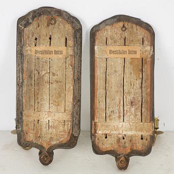 A pair of Swedish rococo engraved glass two-branch girandole mirrors, later part 18th century and later.